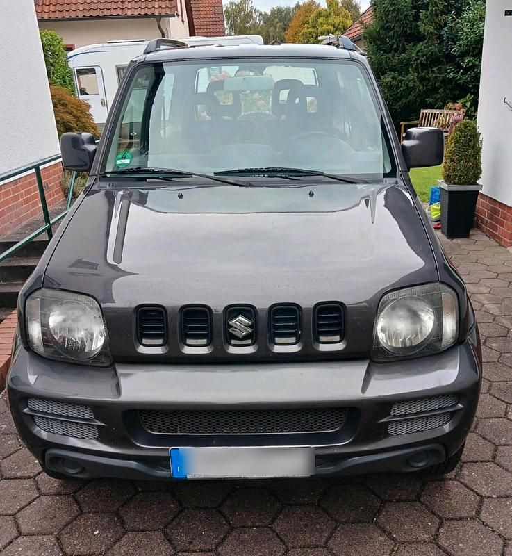 Grau Gebraucht 2011 Suzuki Jimny SUV | 5.100 € (Guter Preis) - Bild 1/4