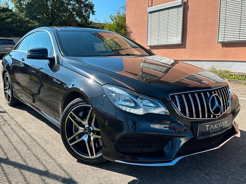 Obsidianschwarz metalliclack Gebraucht 2014 Mercedes E500 AMG Coupé | 25.490 € - Bild 1/4