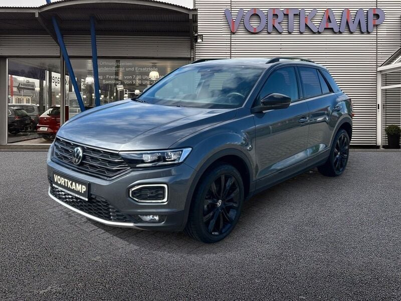 Indiumgrau (metallic) Gebraucht 2022 VW T-Roc Sport SUV | 25.890 € (Guter Preis) - Bild 1/4