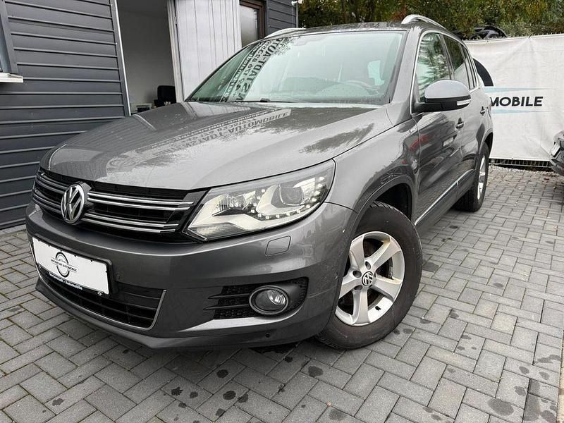 Grau Gebraucht 2014 VW Tiguan Cup SUV | 13.490 € (Etwas zu teuer) - Bild 1/4