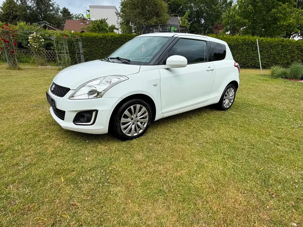 Gebraucht Suzuki Swift 94 PS (69 kW) 2015 Weiß Kleinwagen
