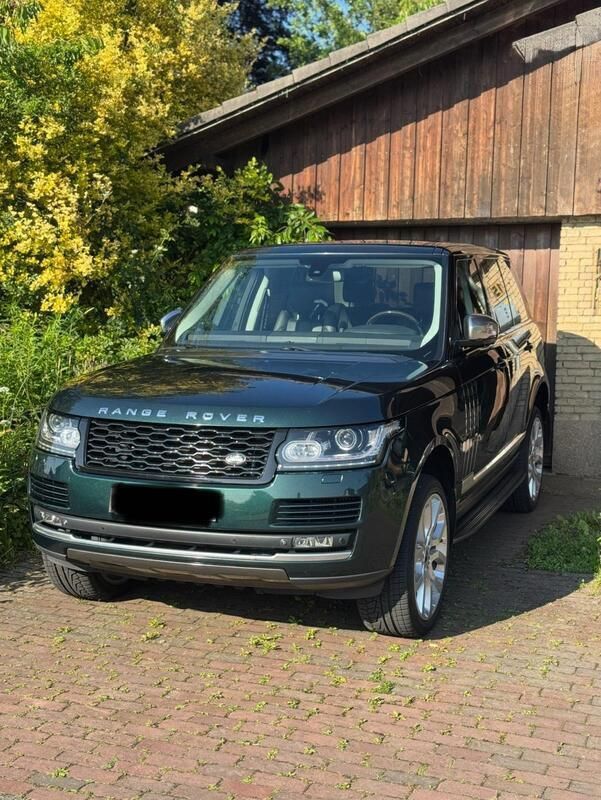 Grün Gebraucht 2013 Land Rover Range Rover Vogue SUV | 28.900 € (Teuer) - Bild 1/4