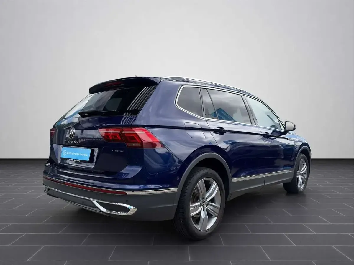 Gebraucht VW Tiguan Allspace Elegance 190 PS (139 kW) 2022 Atlantic blue metallic (metallic) SUV