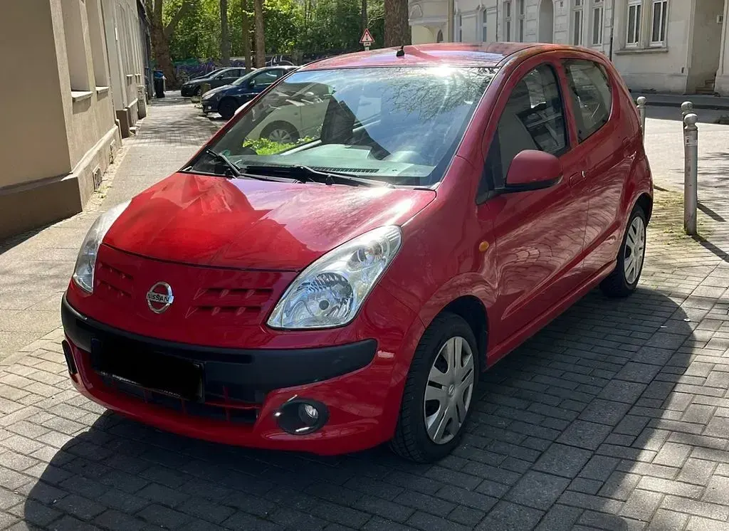 Gebraucht Nissan Pixo 68 PS (50 kW) 2009 Rot Kleinwagen