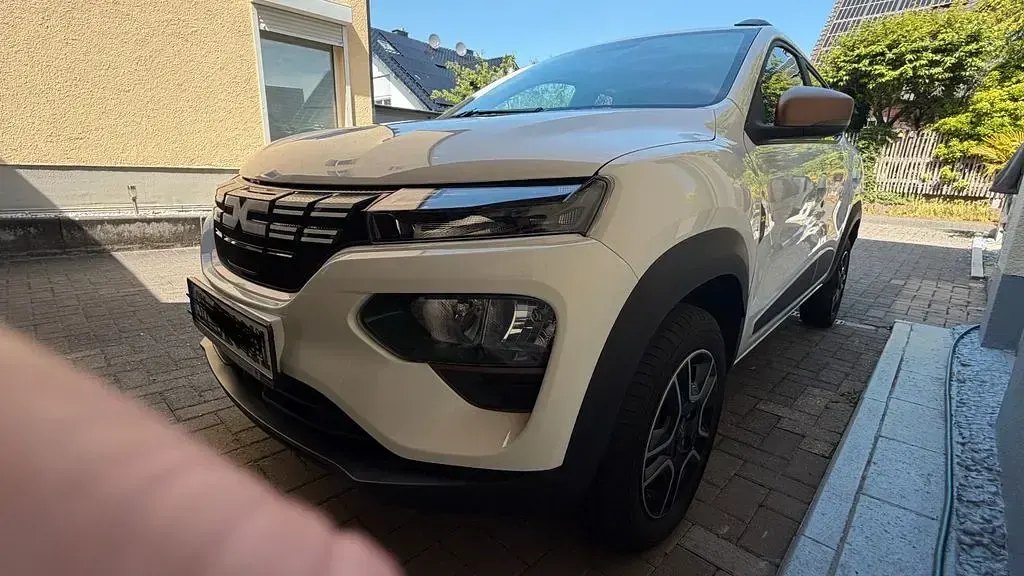 Gebraucht Dacia Spring Extreme 47 kW (65 PS) 2023 Weiß Kleinwagen