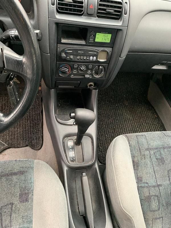 Second-hand Mazda 626 90 CP (66 kW) 1998 Auriu Berlinǎ
