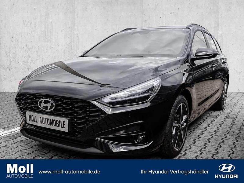 Schwarz (abyss black) Gebraucht 2024 Hyundai i30 Advantage Kombi | 24.890 € (Fairer Preis) - Bild 1/4