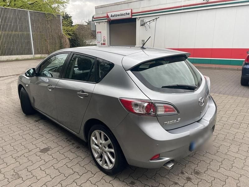 Second-hand Mazda 3 105 CP (77 kW) 2012 Argintiu Berlinǎ