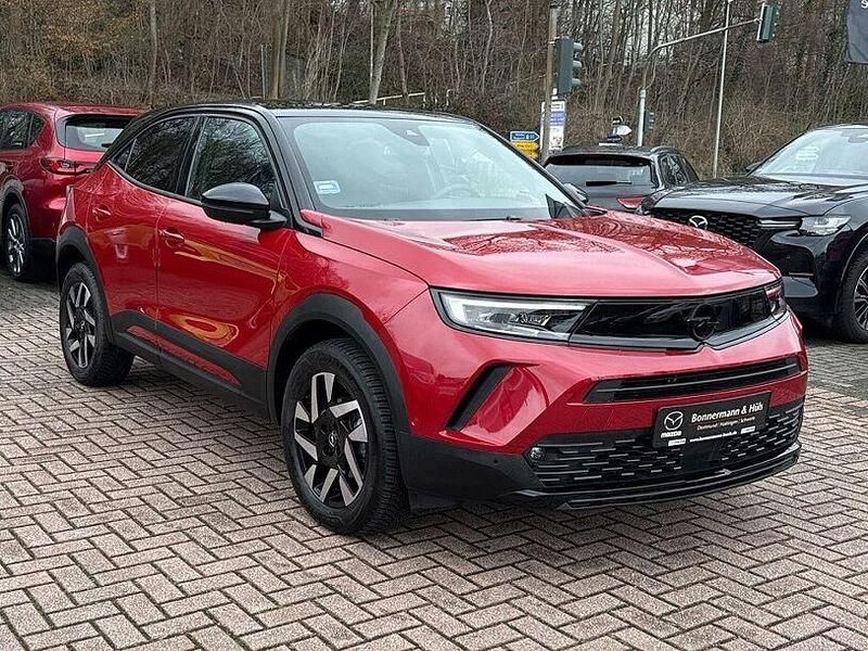 Gebraucht Opel Mokka 131 PS (96 kW) 2024 Lackierung rot rubi/typ aussen SUV