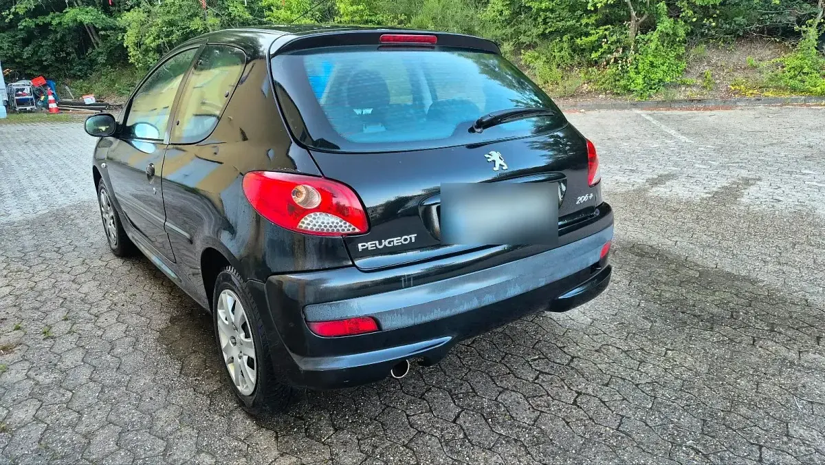Gebraucht Peugeot 206 60 PS (44 kW) 2009 Schwarz Kleinwagen