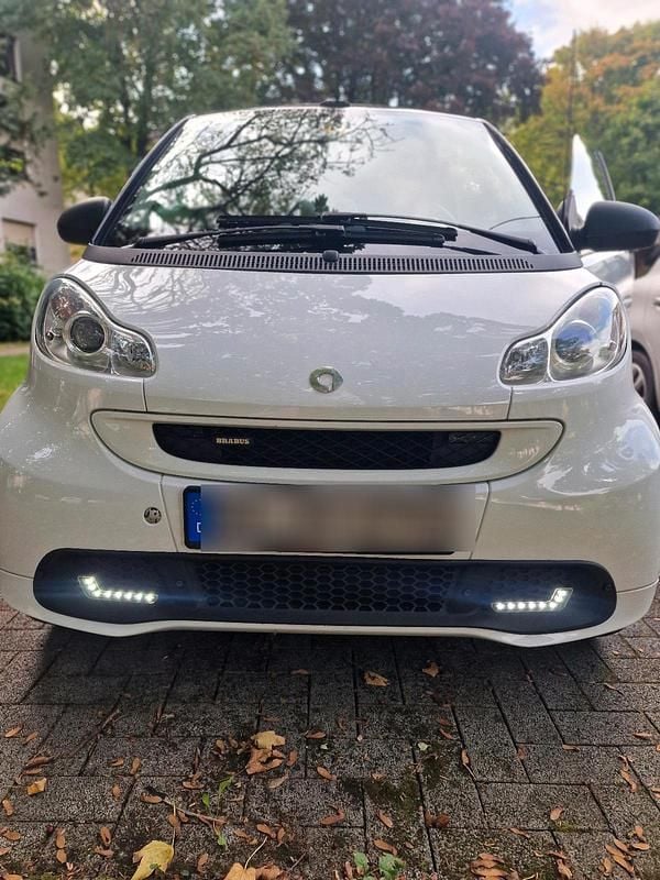 Weiß Gebraucht 2011 Smart ForTwo Cabrio Brabus Cabrio | 6.999 € (Guter Preis) - Bild 1/4