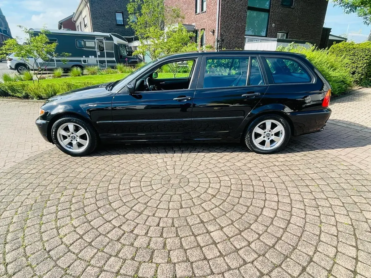 Gebraucht BMW 316 115 PS (84 kW) 2003 Schwarz Kombi
