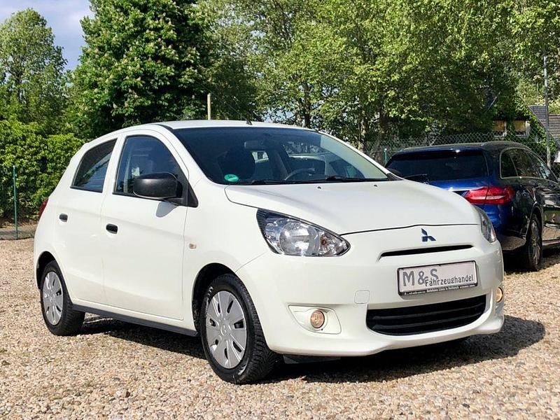 Weiß Gebraucht 2013 Mitsubishi Space Star Kleinwagen | 3.390 € (Fairer Preis) - Bild 1/4