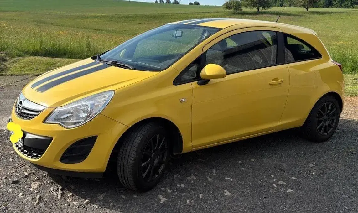 Gebraucht Opel Corsa Edition 69 PS (50 kW) 2012 Gelb Kleinwagen