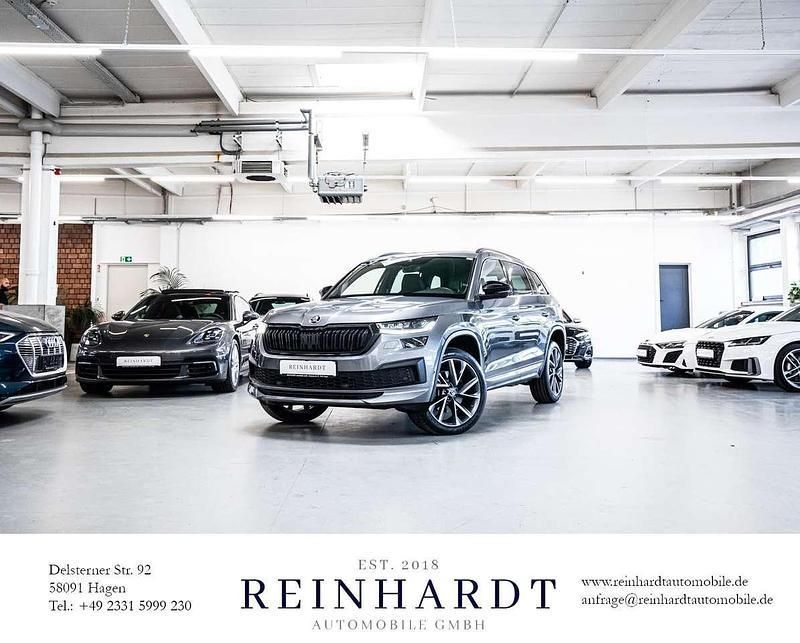Graphitegrau metallic Gebraucht 2022 Skoda Kodiaq SportLine SUV | 34.275 € (Superpreis) - Bild 1/3