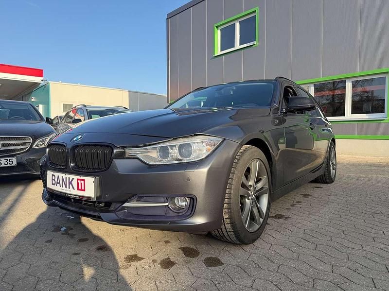Second-hand BMW 318 Performance 143 CP (105 kW) 2014 Gri Break
