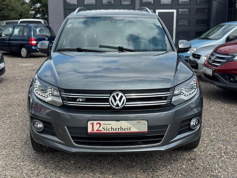 Grau Gebraucht 2014 VW Tiguan Sportline SUV | 13.949 € (Teuer) - Bild 1/4