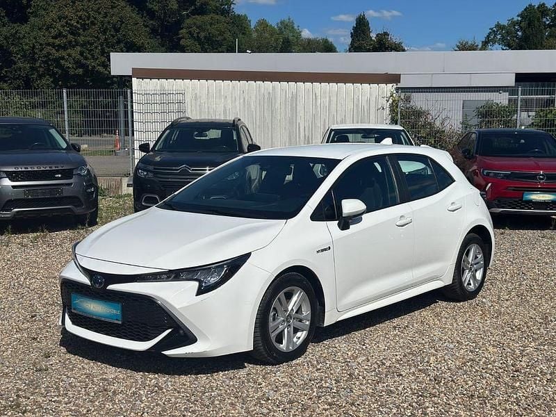 Weiß Gebraucht 2019 Toyota Corolla Hybrid Club Limousine | 16.400 € (Superpreis) - Bild 1/4