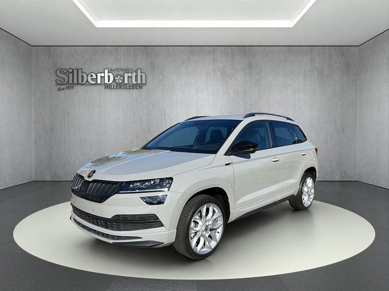 Grau Gebraucht 2022 Skoda Karoq SportLine SUV | 27.790 € (Fairer Preis) - Bild 1/4