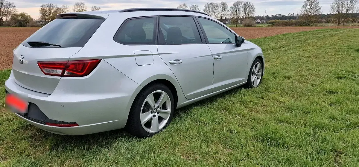Używany Seat Leon 184 KM (135 kW) 2014 Pomarańczowy Kombi