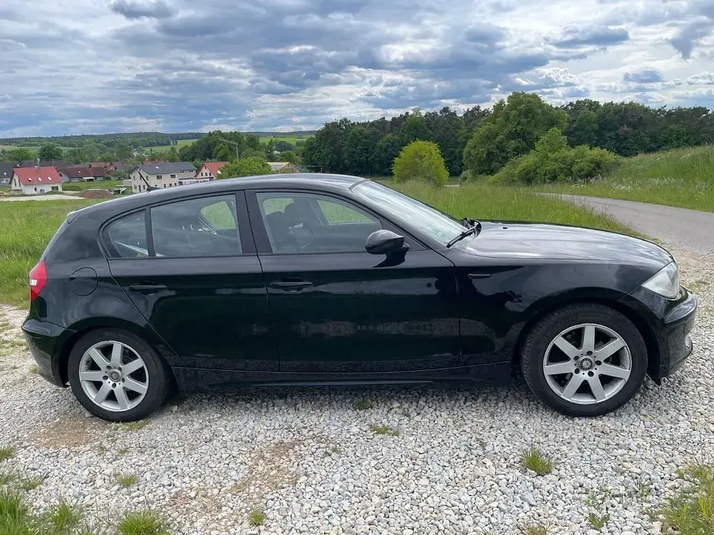 Gebraucht BMW 116 122 PS (89 kW) 2008 Schwarz Kleinwagen