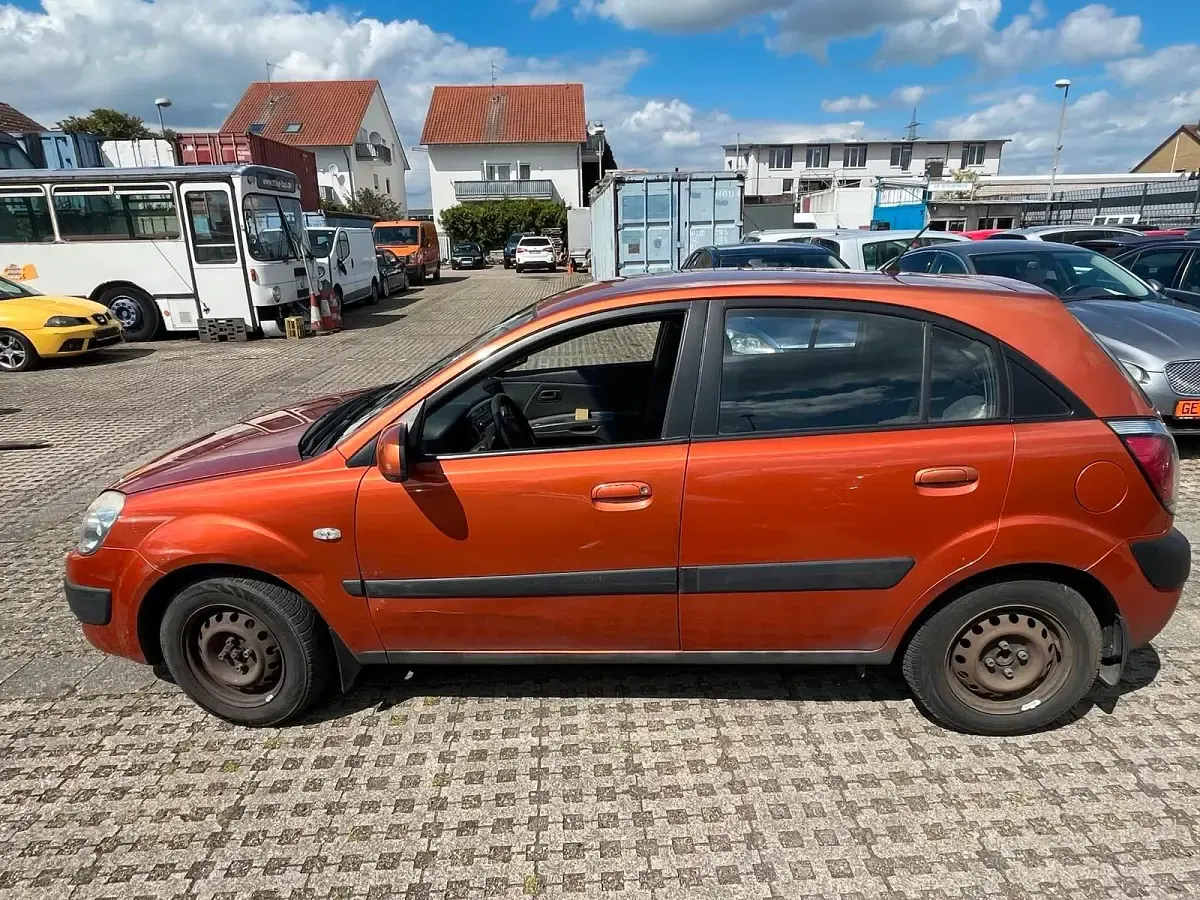 Gebraucht Kia Rio 110 PS (80 kW) 2009 Orange Kleinwagen