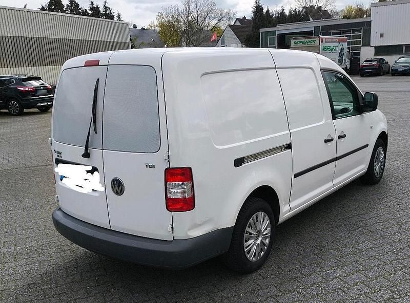 Second-hand VW Caddy Maxi 105 CP (77 kW) 2009 Alb Monovolum