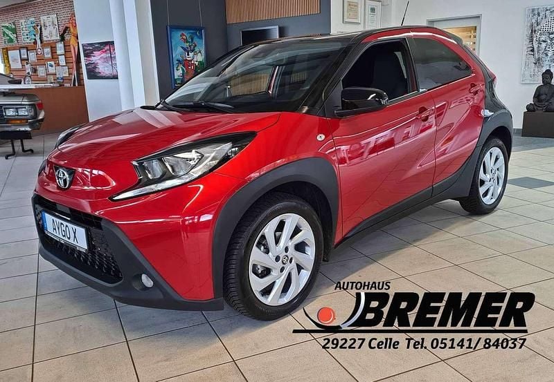 Chili red Gebraucht 2022 Toyota Aygo X Pulse SUV | 14.750 € (Fairer Preis) - Bild 1/4