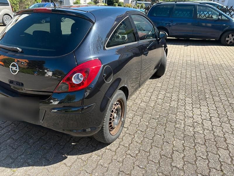 Second-hand Opel Corsa 100 CP (73 kW) 2011 Negru Hatchback