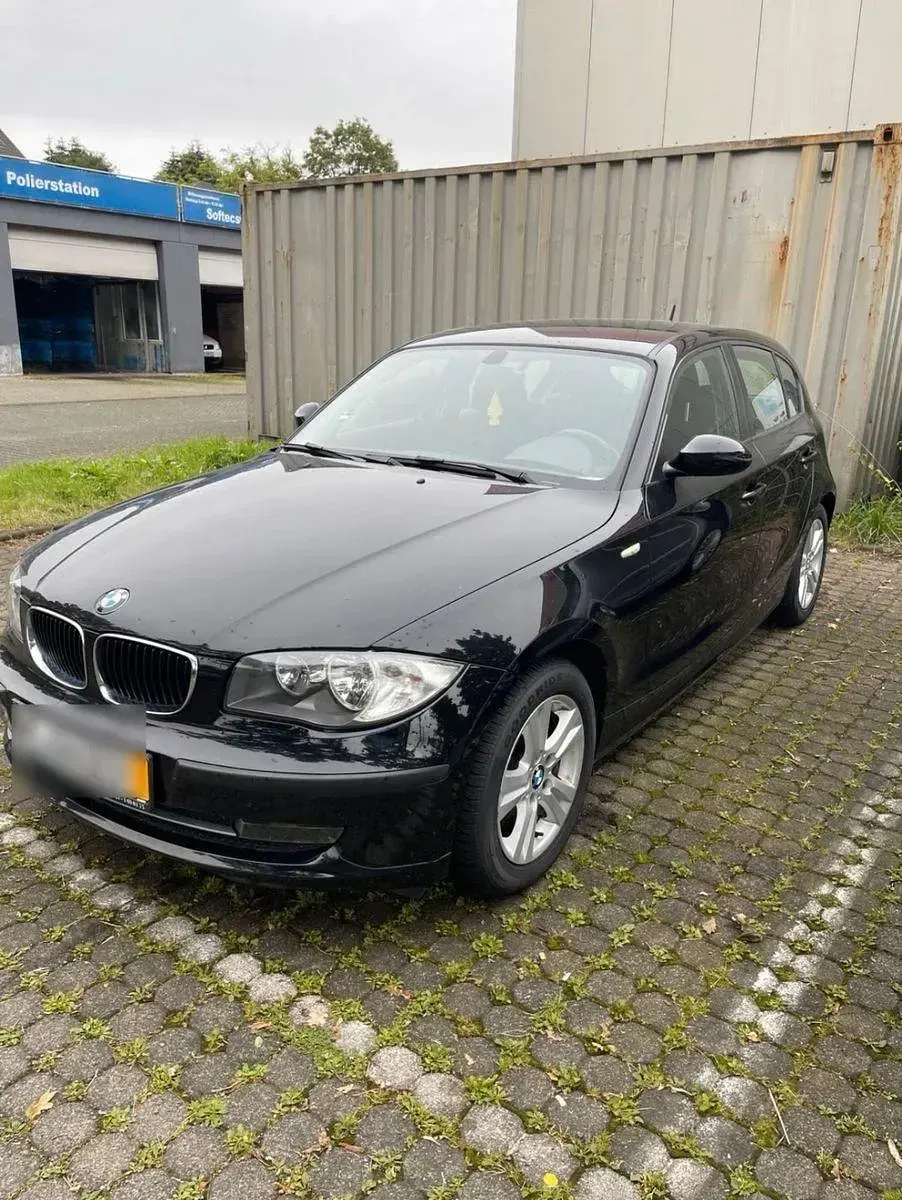 Brugt BMW 116 122 HK (89 kW) 2009 Sort Hatchback
