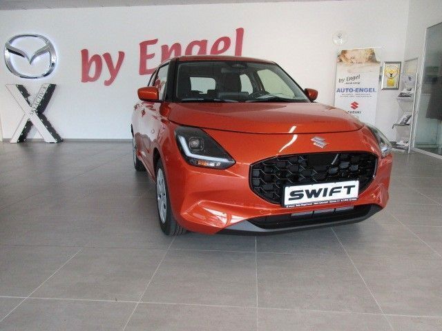 Flame orange pearl Gebraucht 2024 Suzuki Swift Club Kleinwagen | 18.500 € (Fairer Preis) - Bild 1/4