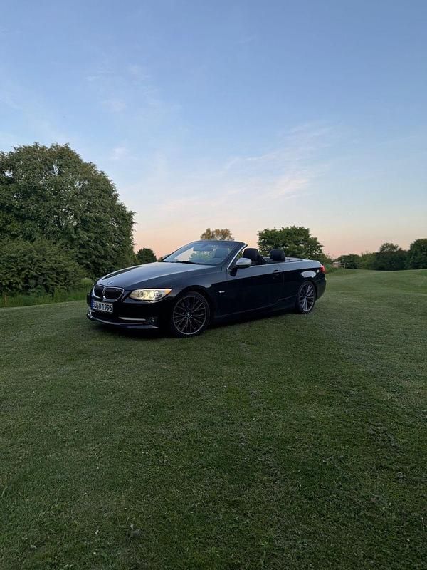 Schwarz Gebraucht 2012 BMW 325 Cabriolet Sport Line Cabrio | 8.499 € (Guter Preis) - Bild 1/4