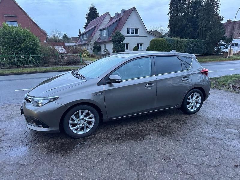 Gebraucht Toyota Auris Hybrid 136 PS (100 kW) 2016 Braun Limousine