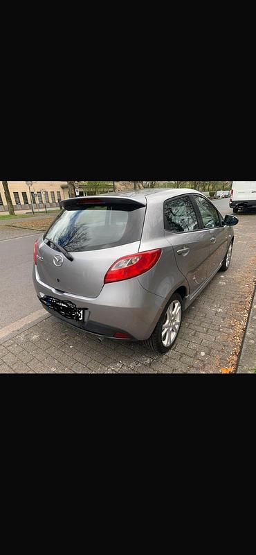 Gebraucht Mazda 2 Inclusive 88 PS (64 kW) 2010 Grau Kleinwagen