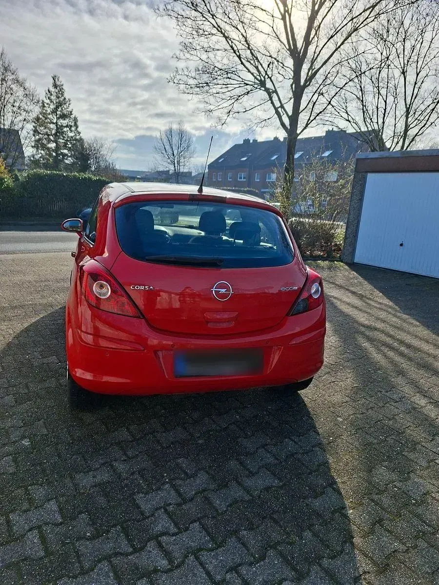 Używany Opel Corsa 60 KM (44 kW) 2009 Czerwony Hatchback