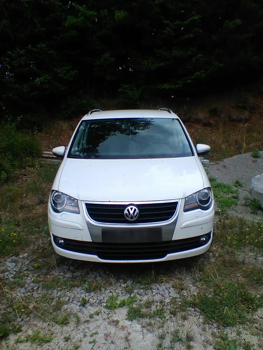 Gebraucht VW Touran 140 PS (102 kW) 2010 Weiß Van / Kleinbus