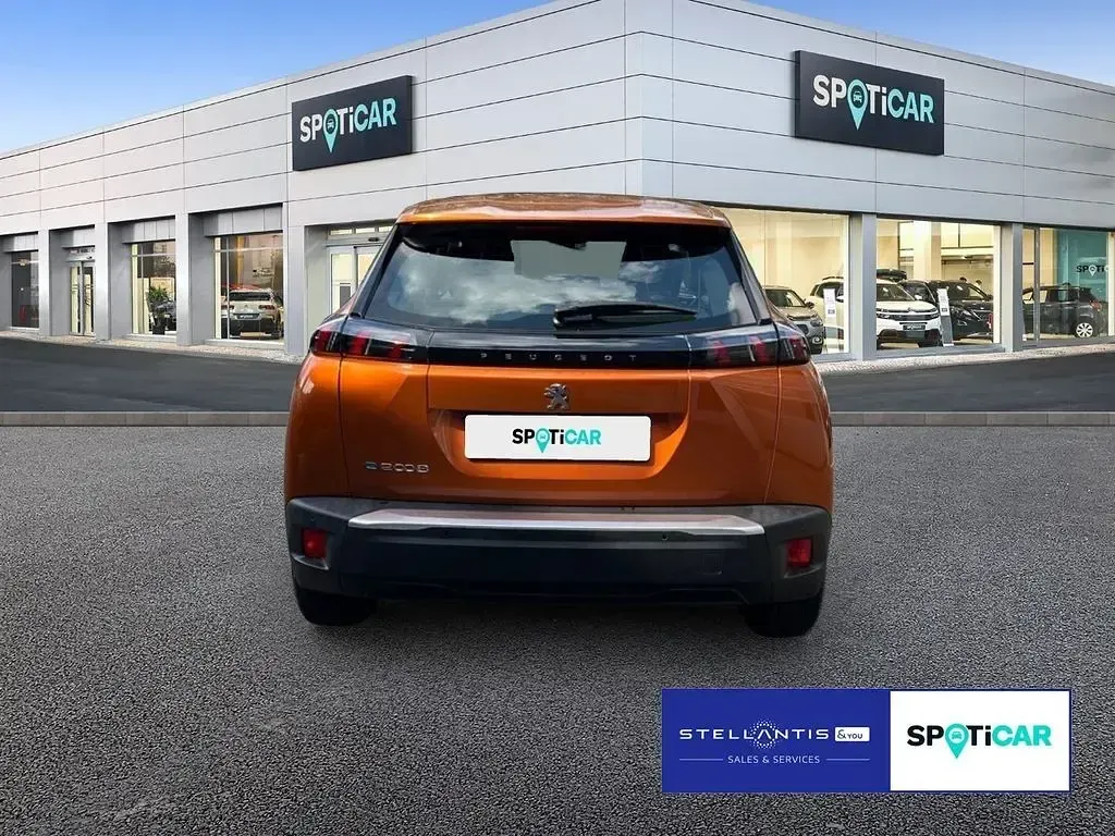 Gebraucht Peugeot e-2008 Active 100 kW (136 PS) 2023 Orange SUV