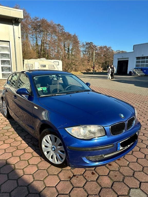 Second-hand BMW 116 122 CP (89 kW) 2009 Albastru Hatchback