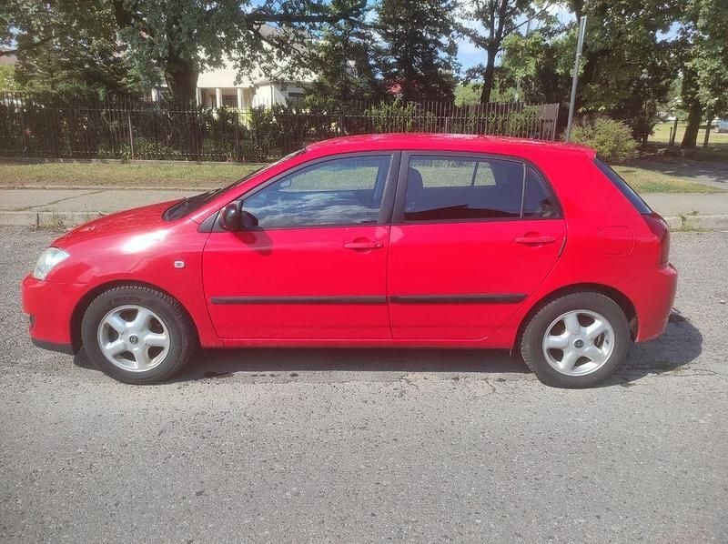 Usado Toyota Corolla 97 HP (71 kW) 2006 Vermelho Sedan