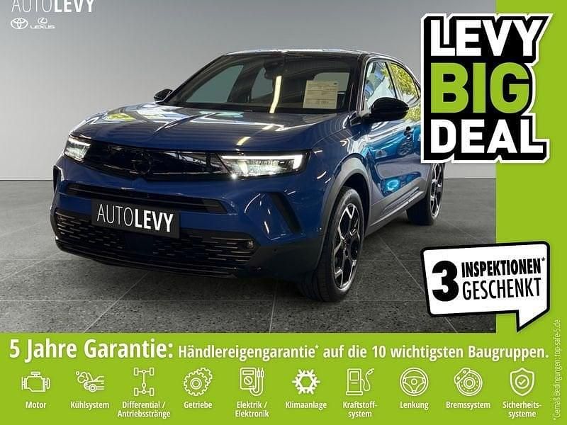 Lackierung voltaic blue met/ty Gebraucht 2024 Opel Mokka Ultimate SUV | 20.570 € (Guter Preis) - Bild 1/4
