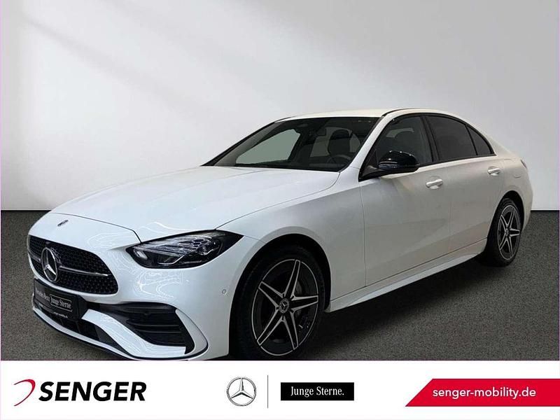 Weiß Gebraucht 2022 Mercedes C300e AMG line Limousine | 41.870 € (Teuer) - Bild 1/4