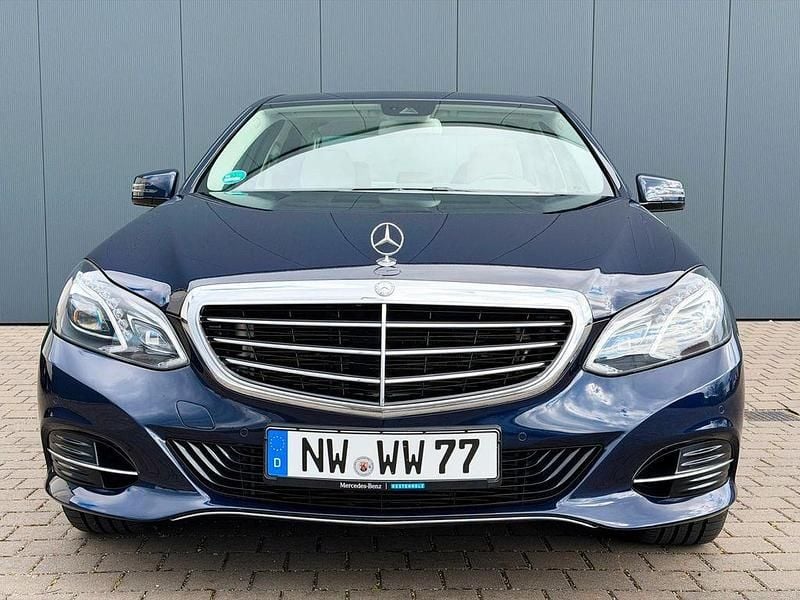 Second-hand Mercedes E400 333 CP (244 kW) 2014 Albastru Berlinǎ