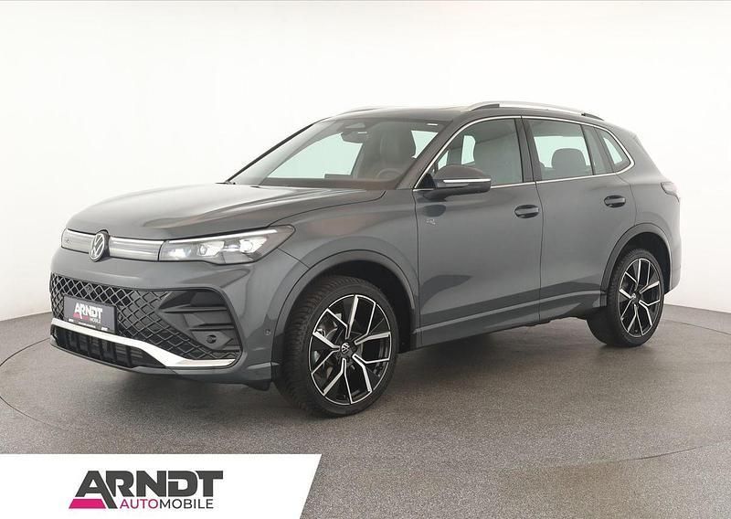 Grau Gebraucht 2024 VW Tiguan R-line SUV | 47.684 € - Bild 1/4