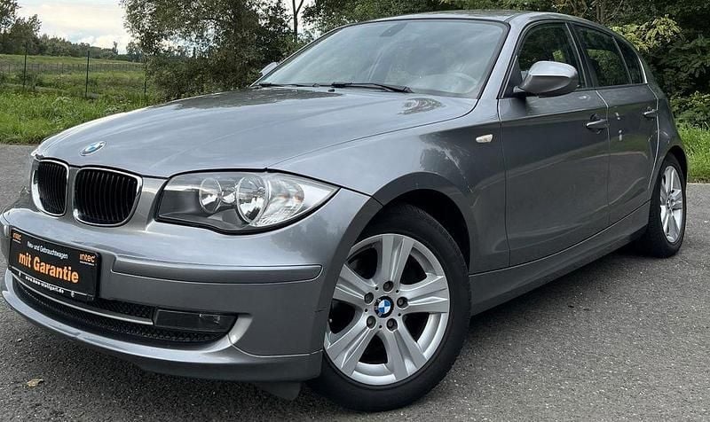 Grau Gebraucht 2011 BMW 116 Sport Line Kleinwagen | 4.990 € (Superpreis) - Bild 1/4