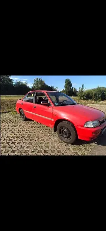 Gebraucht Daihatsu Charade 90 PS (66 kW) 1995 Rot Limousine