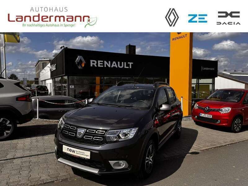 Kometengrau metalli Gebraucht 2018 Dacia Sandero Celebration Kleinwagen | 9.490 € (Fairer Preis) - Bild 1/4