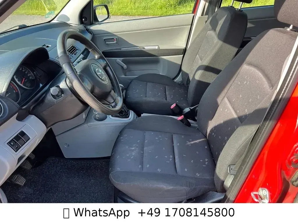 Używany Mazda 2 Comfort 75 KM (55 kW) 2004 Czerwony Hatchback