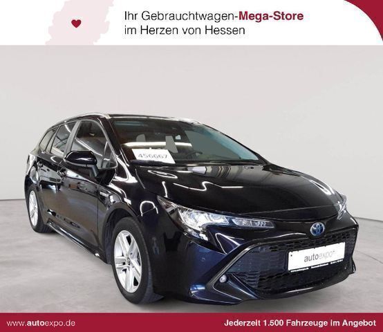 Nagoyablau metallic Gebraucht 2021 Toyota Corolla Business Edition Kombi | 19.390 € - Bild 1/4