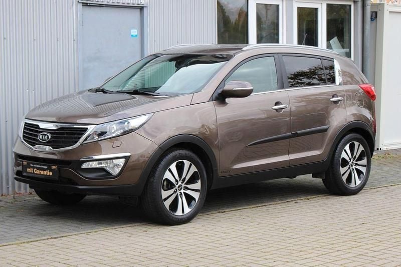 Braun Gebraucht 2011 Kia Sportage Spirit SUV | 11.490 € (Fairer Preis) - Bild 1/4