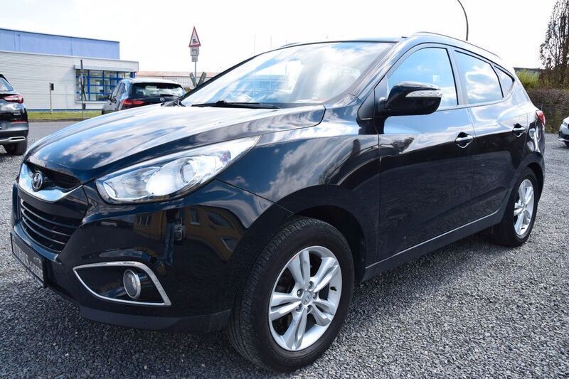 Schwarz Gebraucht 2013 Hyundai Tucson SUV | 7.488 € (Teuer) - Bild 1/4
